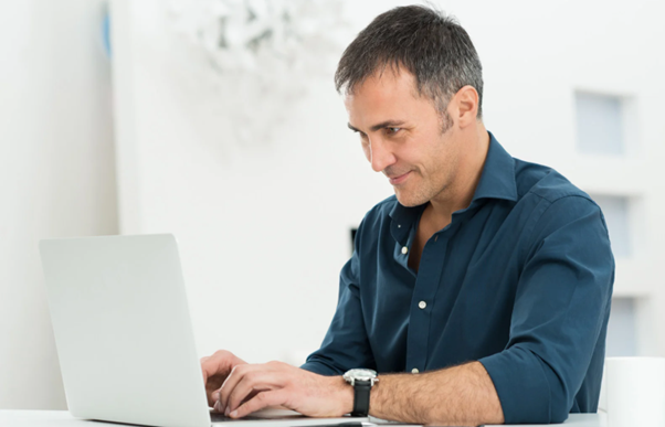 Entrepreneur reviewing business documents while planning how to set up a company in the UK.